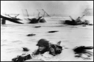 robert-capa-dday-face-in-the-surf